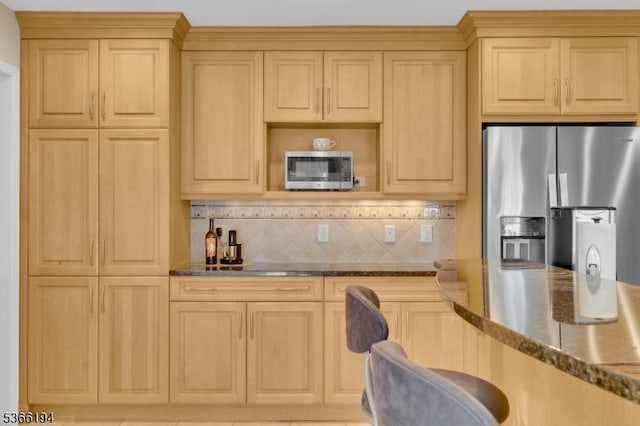 2 Kerry Pl, Mount Olive Twp, NJ 07836 - kitchen with stainless steel appliances, dark stone counters, backsplash, and light brown cabinets