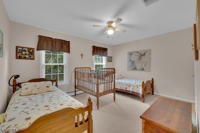 2 Kerry Pl, Mount Olive Twp, NJ 07836 - bedroom featuring a baseboard heating unit, carpet, and a ceiling fan