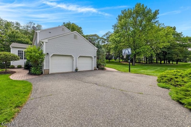 2 Kerry Pl, Mount Olive Twp, NJ 07836 - view of side of home with driveway, an attached garage, and a lawn