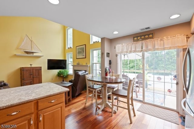 1305 S Branch Dr, Readington Twp, NJ 08889 - dining space with wood finished floors, a fireplace, and recessed lighting