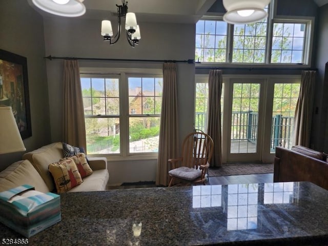 1-23 Pine Cres Unit 23, Vernon Twp, NJ 07462 - doorway to outside with a chandelier and plenty of natural light