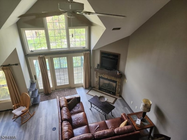 1-23 Pine Cres Unit 23, Vernon Twp, NJ 07462 - living room with ceiling fan, high vaulted ceiling, a fireplace, healthy amount of natural light, and wood finished floors