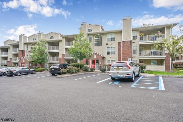 2112 Schindler Ln, Wayne Twp, NJ 07470 - view of apartment building / complex with uncovered parking