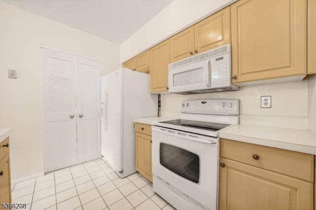 2112 Schindler Ln, Wayne Twp, NJ 07470 - kitchen featuring white appliances, light countertops, and light tile patterned floors