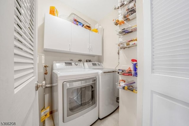 2112 Schindler Ln, Wayne Twp, NJ 07470 - laundry room featuring washer and clothes dryer and cabinet space