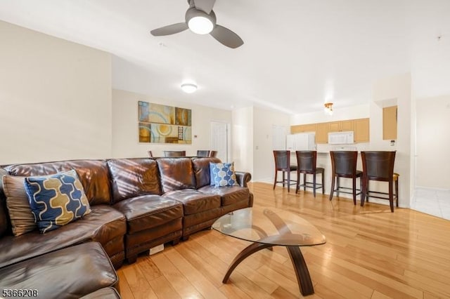 2112 Schindler Ln, Wayne Twp, NJ 07470 - living room with light wood-style flooring and a ceiling fan