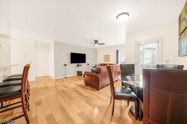2112 Schindler Ln, Wayne Twp, NJ 07470 - dining room featuring light wood-type flooring and a ceiling fan