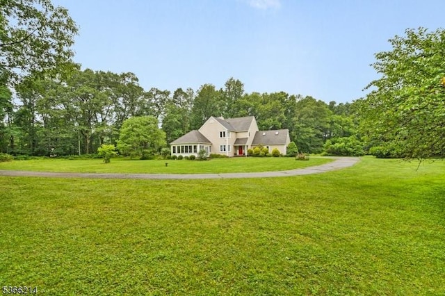 33 Kings Hwy, Washington Twp, NJ 07853 - view of front of house featuring a front yard and a forest view