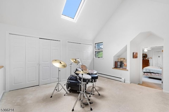 33 Kings Hwy, Washington Twp, NJ 07853 - recreation room featuring baseboard heating, carpet, high vaulted ceiling, and a skylight