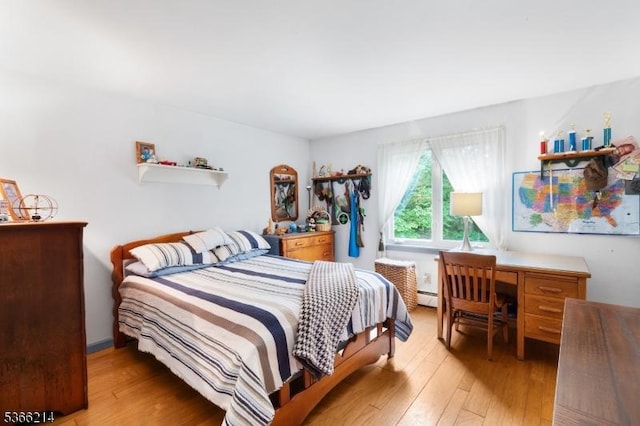 33 Kings Hwy, Washington Twp, NJ 07853 - bedroom with light wood-style floors and baseboard heating