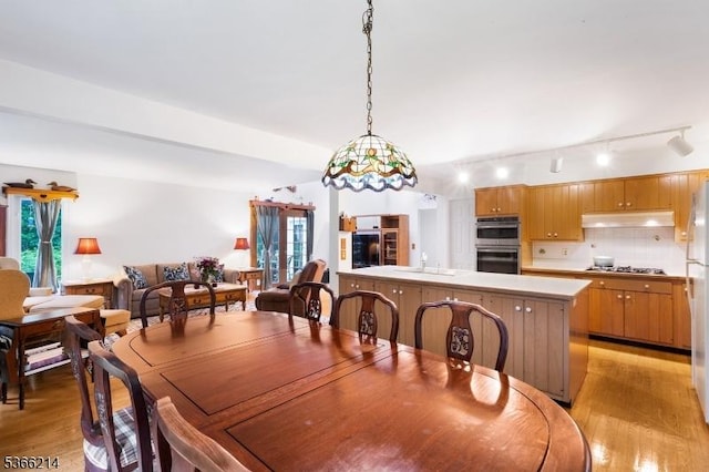 33 Kings Hwy, Washington Twp, NJ 07853 - dining space with light wood-type flooring and rail lighting