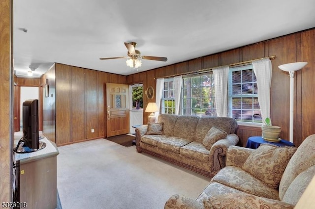 15 Stony Brook Rd, Byram Twp, NJ 07874 - carpeted living room featuring wooden walls and a ceiling fan