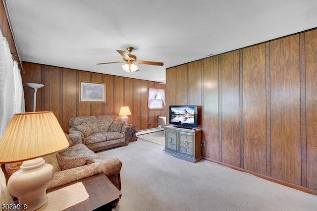 15 Stony Brook Rd, Byram Twp, NJ 07874 - living area with a ceiling fan, light carpet, wood walls, and baseboard heating