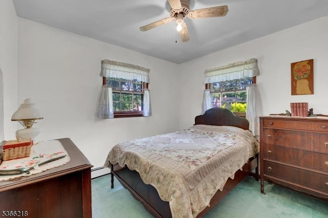 15 Stony Brook Rd, Byram Twp, NJ 07874 - carpeted bedroom with a baseboard heating unit and a ceiling fan