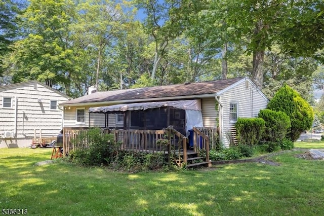 15 Stony Brook Rd, Byram Twp, NJ 07874 - back of property with a wooden deck, a lawn, and a chimney