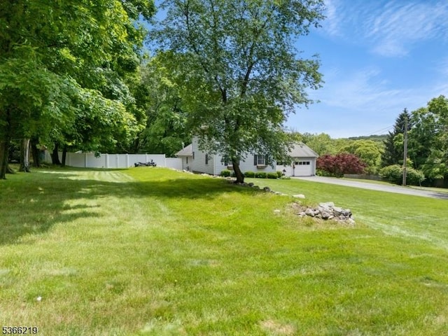 12 Ridge Rd, West Milford Twp, NJ 07480 - view of yard featuring driveway and an attached garage