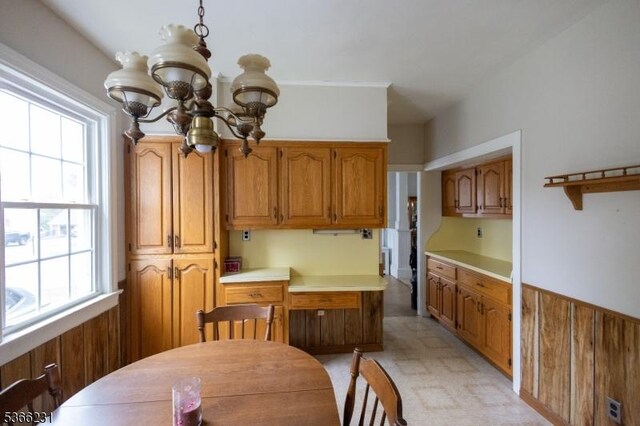 48 Keller Ave, Rockaway Boro, NJ 07866 - kitchen with a chandelier, brown cabinets, and light countertops