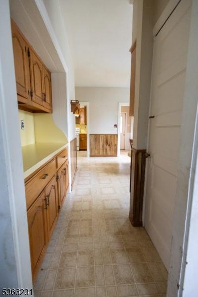 48 Keller Ave, Rockaway Boro, NJ 07866 - hallway with wainscoting and light flooring