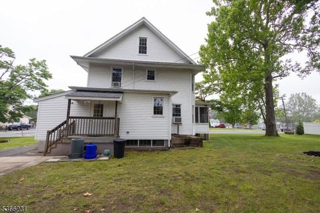 48 Keller Ave, Rockaway Boro, NJ 07866 - rear view of house with a lawn