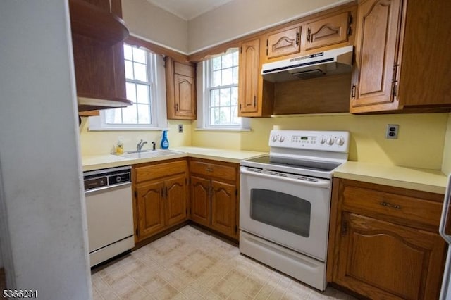 48 Keller Ave, Rockaway Boro, NJ 07866 - kitchen featuring white appliances, under cabinet range hood, light countertops, and brown cabinets
