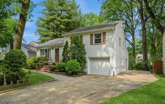 856 Colonial Arms Rd, Union Twp, NJ 07083 - tri-level home featuring driveway and an attached garage