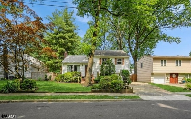 856 Colonial Arms Rd, Union Twp, NJ 07083 - tri-level home featuring driveway and a chimney