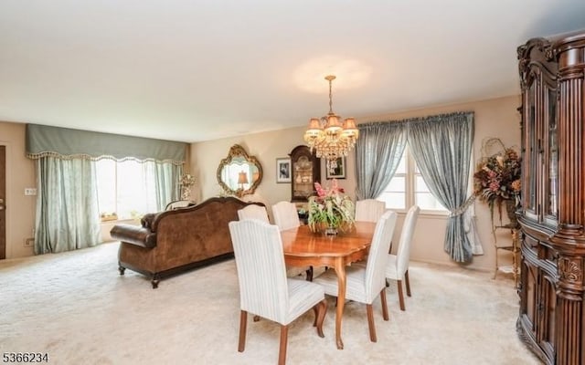 856 Colonial Arms Rd, Union Twp, NJ 07083 - dining space with a chandelier and light carpet