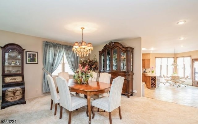 856 Colonial Arms Rd, Union Twp, NJ 07083 - dining space featuring a chandelier and light carpet