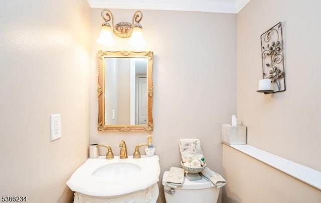 856 Colonial Arms Rd, Union Twp, NJ 07083 - half bath featuring vanity and ornamental molding
