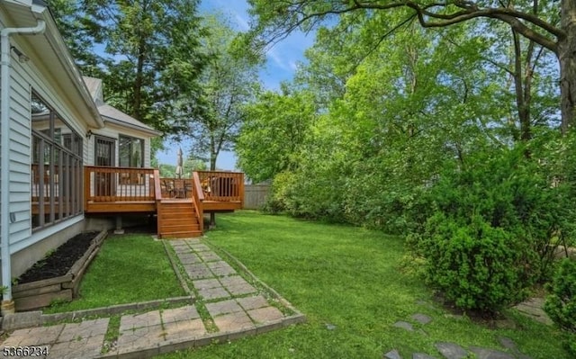 856 Colonial Arms Rd, Union Twp, NJ 07083 - view of green lawn featuring a wooden deck and a sunroom