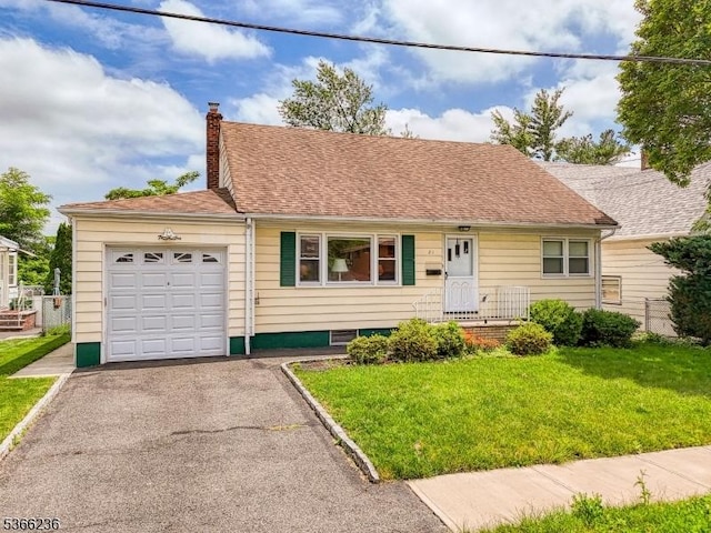 21 Academy Ter, Linden City, NJ 07036 - view of front of home with an attached garage, asphalt driveway, a front lawn, and a chimney