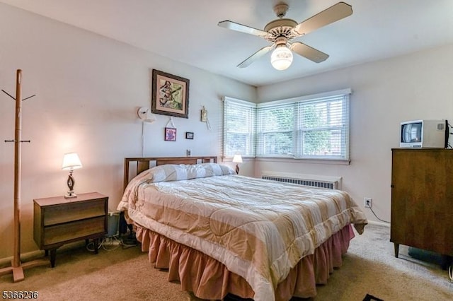 21 Academy Ter, Linden City, NJ 07036 - bedroom featuring carpet flooring, radiator heating unit, and a ceiling fan