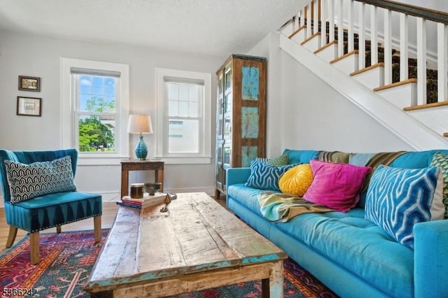 86 Riverside Dr, Denville Twp, NJ 07834 - living room featuring wood finished floors and stairway