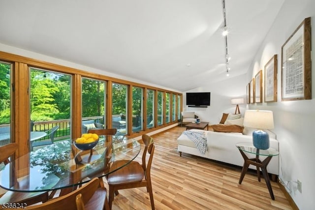 86 Riverside Dr, Denville Twp, NJ 07834 - sunroom featuring rail lighting, wood finished floors, vaulted ceiling, and a wooden deck
