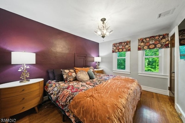 86 Riverside Dr, Denville Twp, NJ 07834 - bedroom featuring wood finished floors and a chandelier
