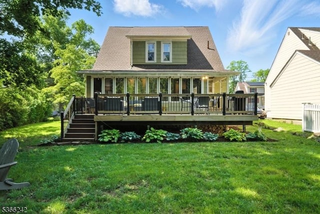 86 Riverside Dr, Denville Twp, NJ 07834 - rear view of property featuring a wooden deck, a lawn, a sunroom, and stairway