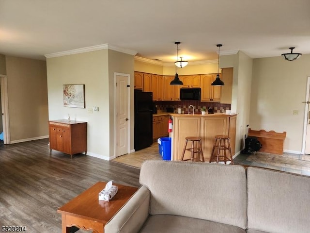 7-11 Maple Cres Unit 11, Vernon Twp, NJ 07462 - living room featuring wood finished floors and crown molding