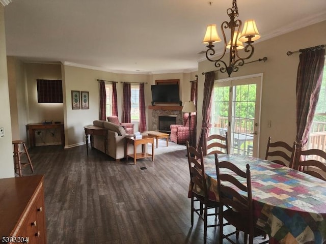 7-11 Maple Cres Unit 11, Vernon Twp, NJ 07462 - dining area featuring dark wood finished floors, a fireplace, ornamental molding, and a chandelier