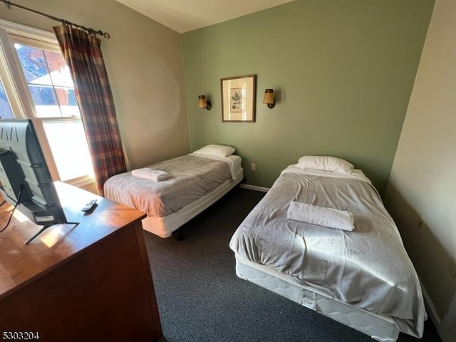 7-11 Maple Cres Unit 11, Vernon Twp, NJ 07462 - carpeted bedroom featuring baseboards