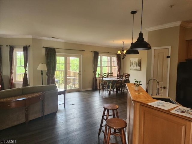 7-11 Maple Cres Unit 11, Vernon Twp, NJ 07462 - kitchen with butcher block countertops, a chandelier, black fridge, dark wood-style floors, and ornamental molding