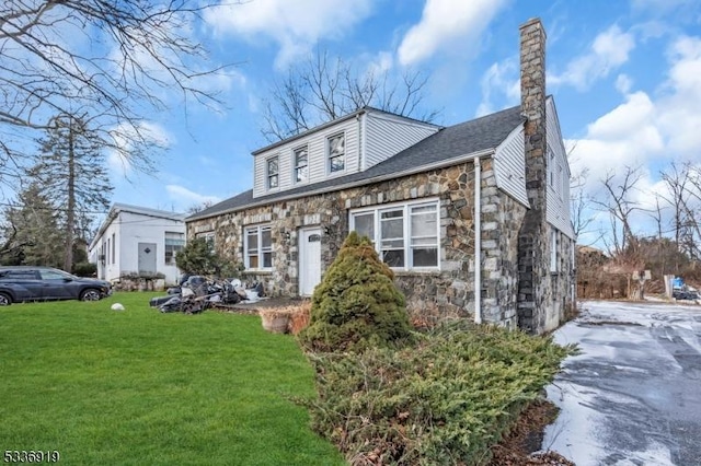 797 Passaic Ave, West Caldwell Twp, NJ 07006 - view of front facade with stone siding, a chimney, and a front lawn