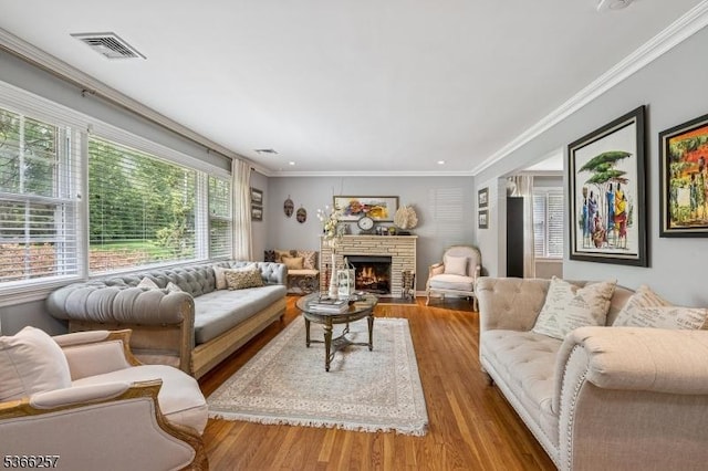 1127 Mountain Ave, Berkeley Heights Twp, NJ 07922 - living area featuring ornamental molding, wood finished floors, and a fireplace