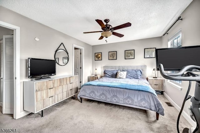 2904 Pinhorn Dr, Bridgewater Twp, NJ 08807 - bedroom featuring light carpet, a textured ceiling, and a ceiling fan