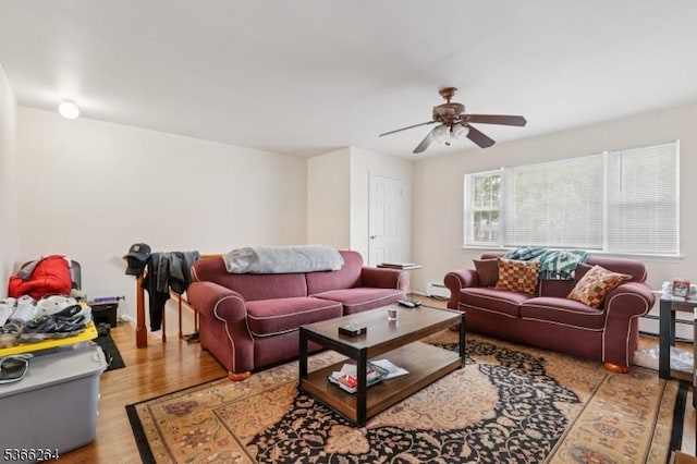 1245B Valley Rd Unit B, Wayne Twp, NJ 07470 - living room featuring a ceiling fan, light wood-style floors, a baseboard radiator, and a baseboard heating unit