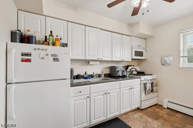1245B Valley Rd Unit B, Wayne Twp, NJ 07470 - kitchen featuring white appliances, a baseboard radiator, a ceiling fan, white cabinets, and light stone finish floors