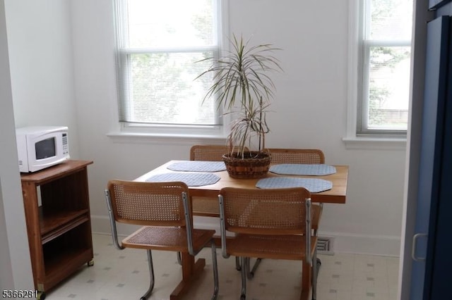 2132 Alberta Ave, Linden City, NJ 07036 - dining room with tile patterned floors and baseboards