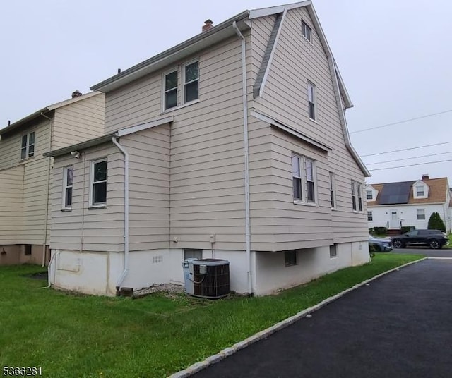 2132 Alberta Ave, Linden City, NJ 07036 - view of side of property featuring a chimney and a yard