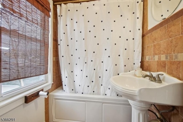 64 Rollinson St, West Orange Twp, NJ 07052 - full bath featuring tile walls and shower / tub combo