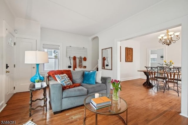 64 Rollinson St, West Orange Twp, NJ 07052 - living room with wood finished floors, a chandelier, and stairway