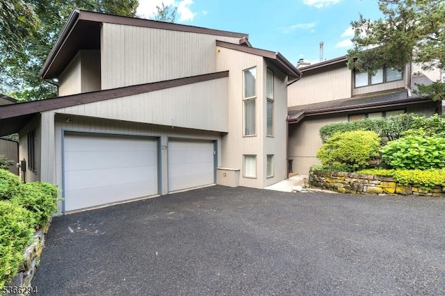 29 Stonegate Dr, Watchung Boro, NJ 07069 - mid-century home with a garage and driveway